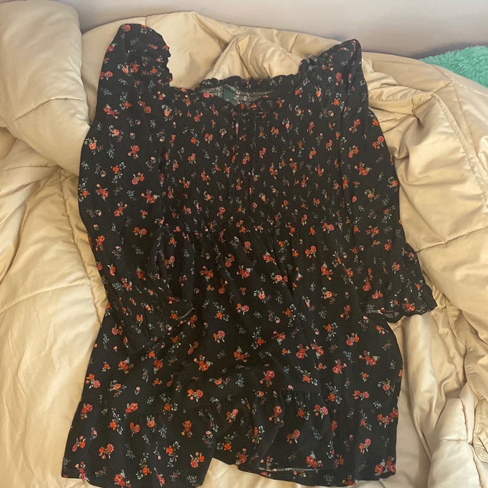 Black off the shoulder dress with red floral print